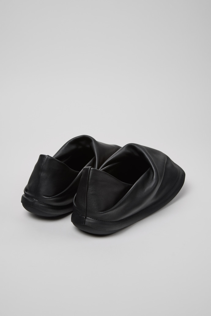 Back view of Camper x ISSEY MIYAKE - Peu Form Black Leather Shoes for Men.