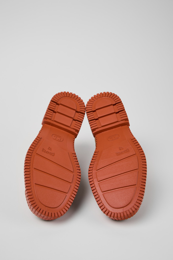 The soles of Pix Brown Suede Shoes for Men.