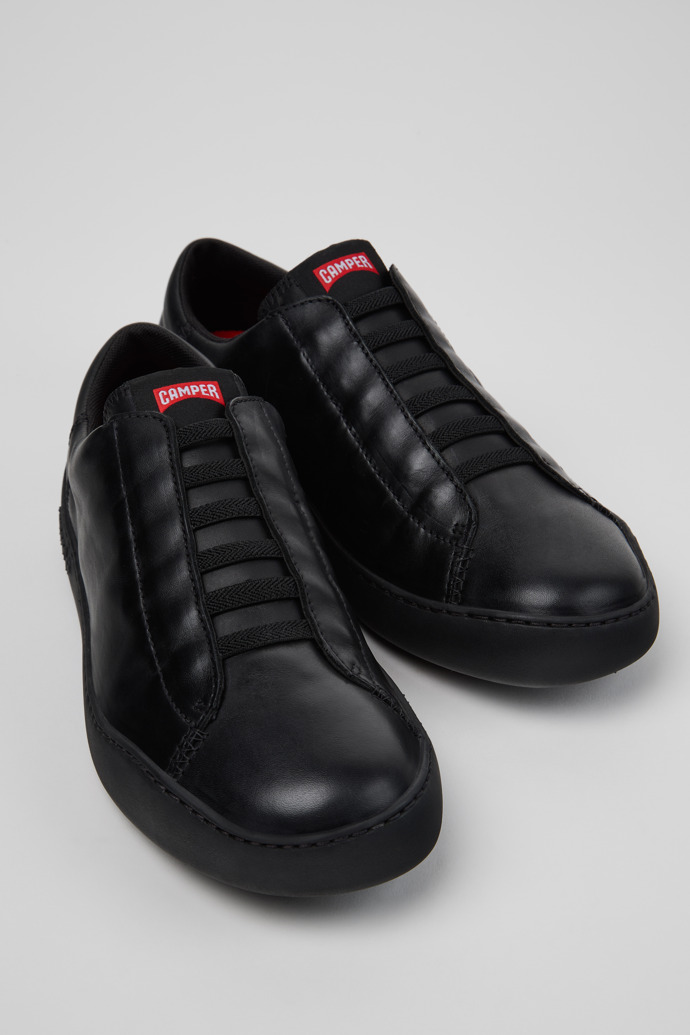 Close-up view of Peu Touring Black Leather Sneakers for Men.