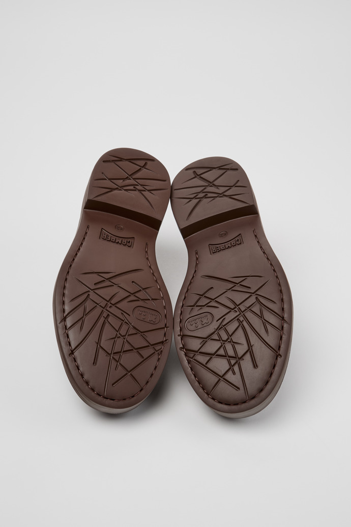 The soles of Twins Brown Leather Nautical Moccasins for Men.