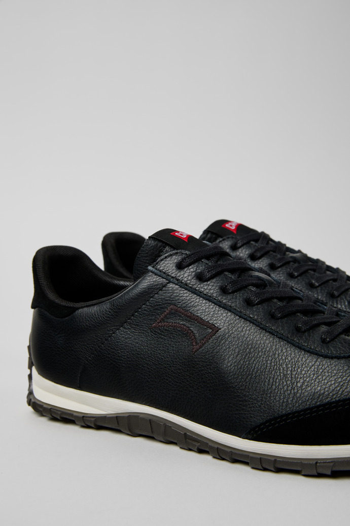 Close-up view of Drift Walk Black Leather and Nubuck Sneakers for Men.