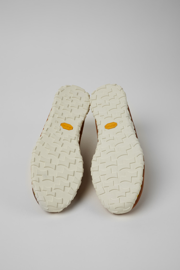 The soles of Drift Walk Brown Suede and Leather Sneakers for Men.