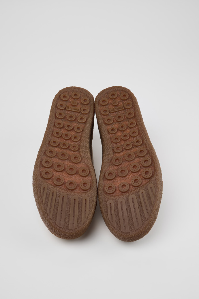 The soles of Peu Terreno Beige Suede Shoes for Men.