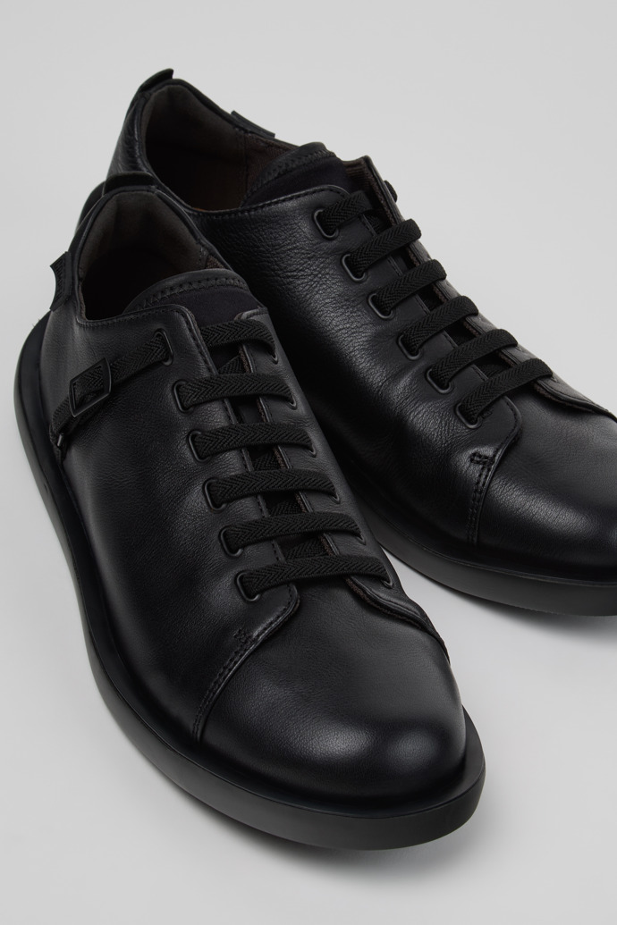 Close-up view of Wagon Black Leather and Textile Shoes for Men.