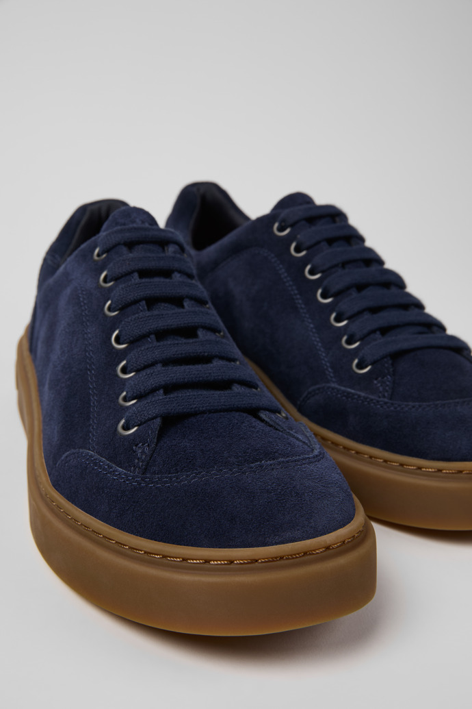 Close-up view of Runner Twentyfive Blue Suede Sneakers for Men.