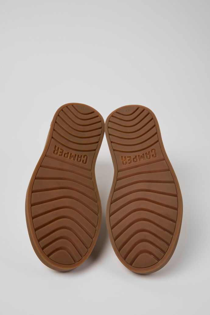 The soles of Runner Twentyfive White Leather Sneakers for Men.