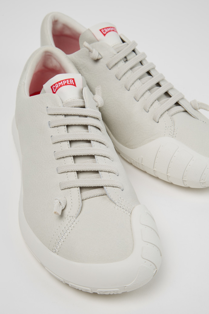 Close-up view of Peu Path+ White Leather Shoes for Men.