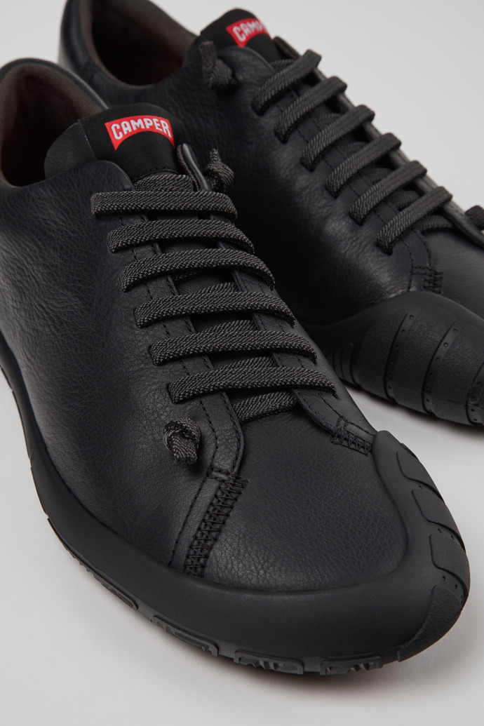 Close-up view of Peu Path+ Black Leather Shoes for Men.