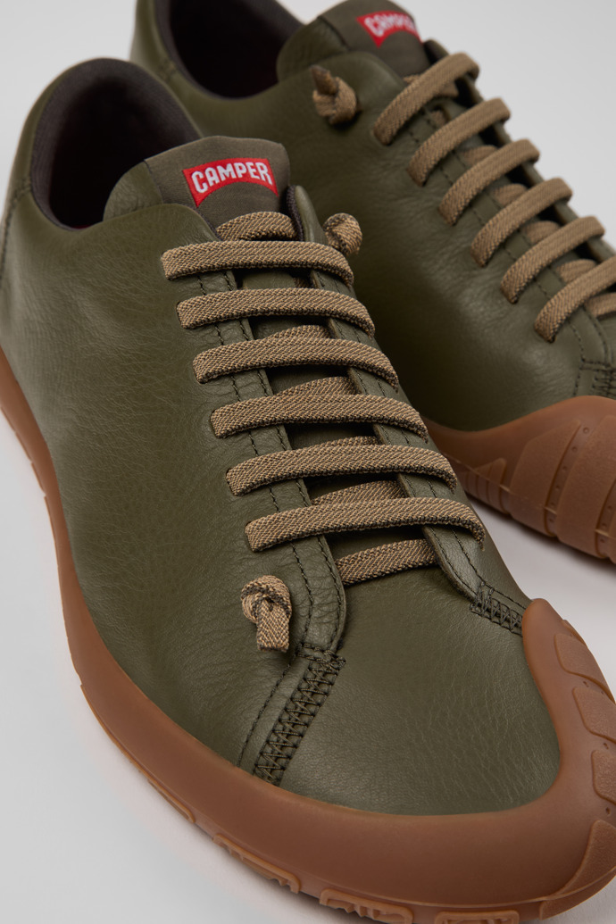 Close-up view of Peu Path+ Green Leather Shoes for Men.