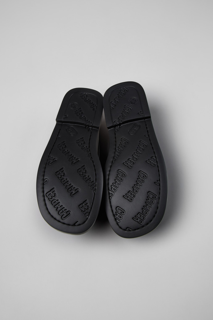 The soles of Twins Black Leather Shoes for Men.