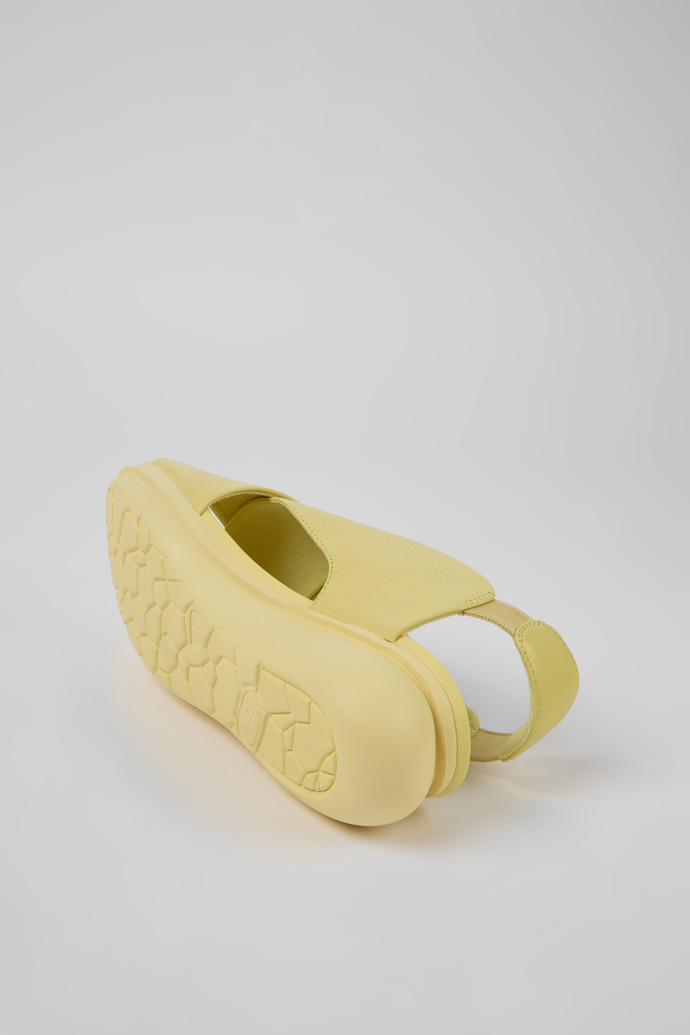 The soles of Balloon Yellow leather sandals for women