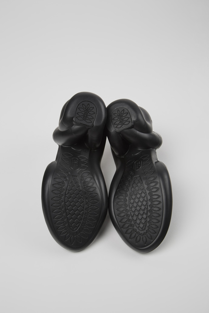 The soles of Kobarah Black unisex sandals