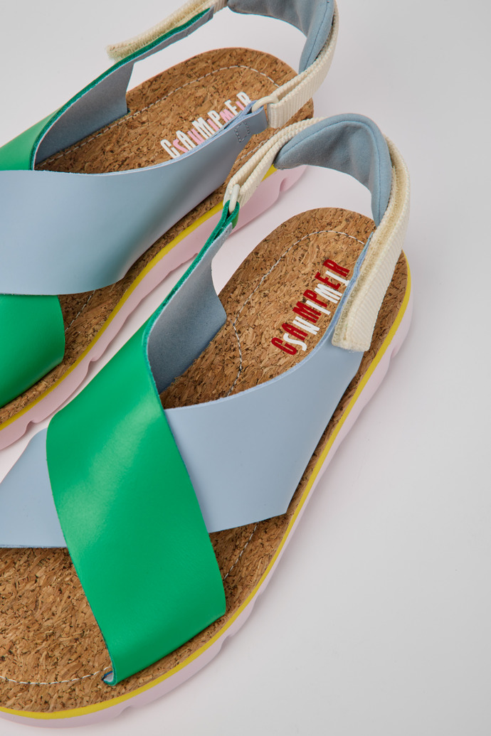 Close-up view of Twins Green and blue sandals for women