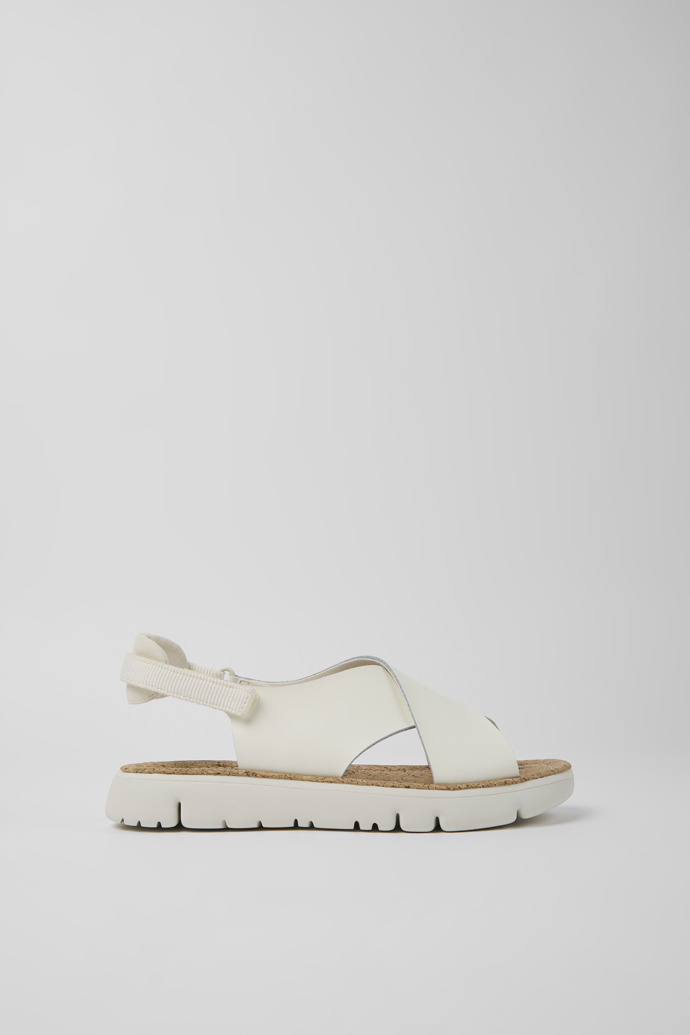 Side view of Oruga White leather and textile sandals for women