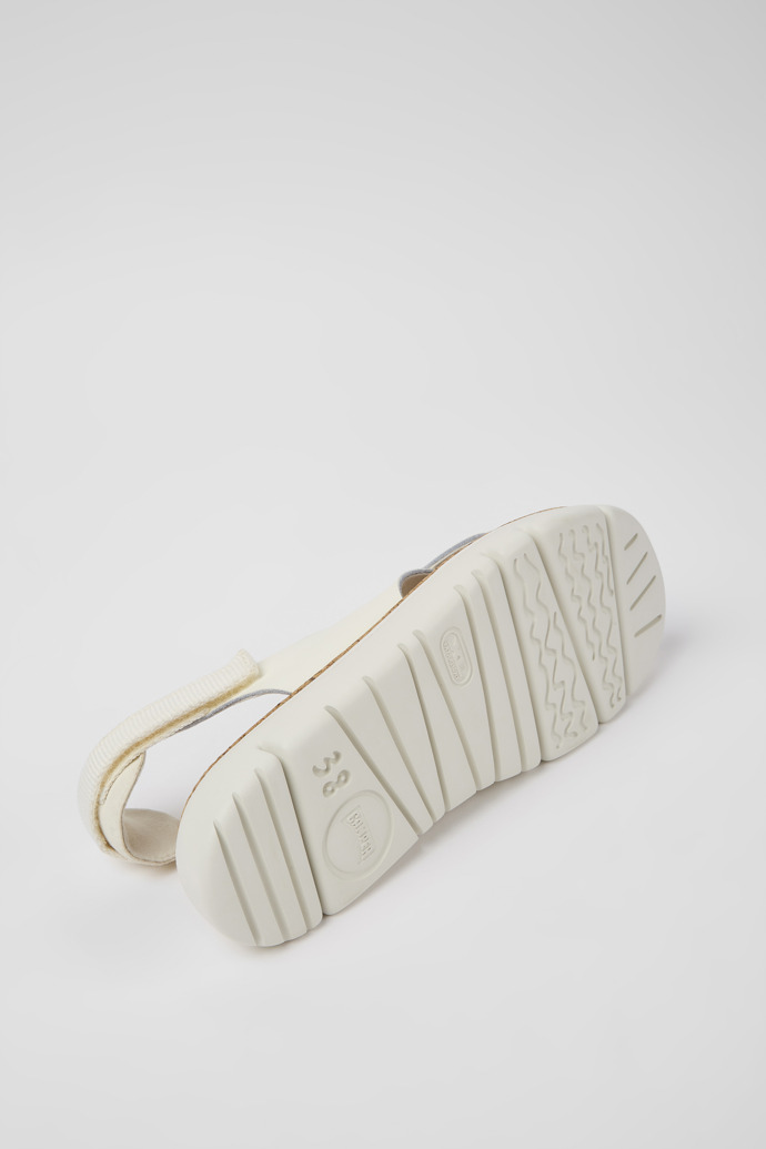 The soles of Oruga White leather and textile sandals for women