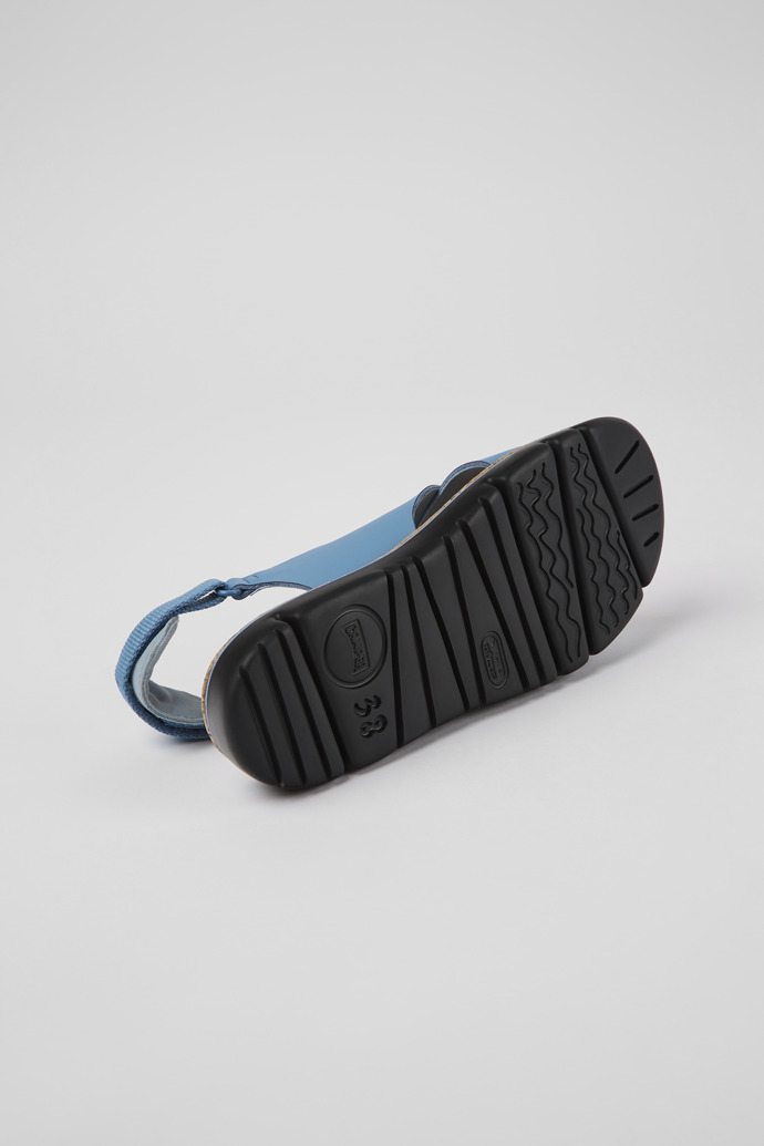 The soles of Oruga Blue leather and textile sandals for women