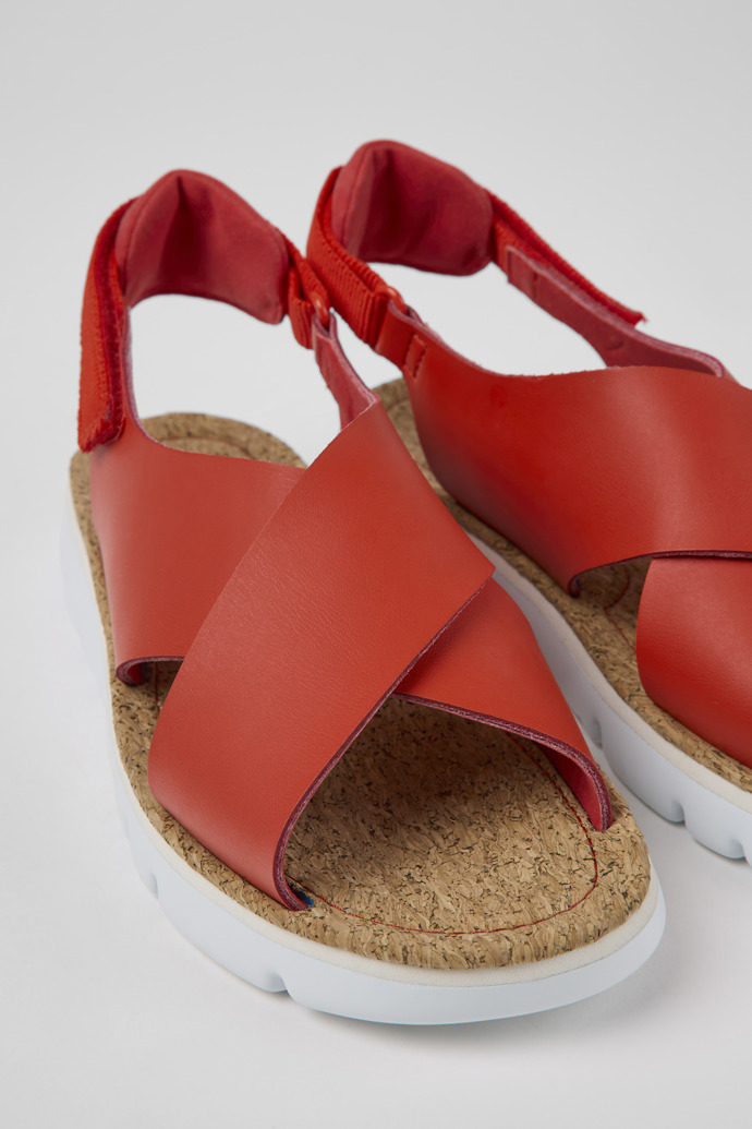 Close-up view of Oruga Red leather and textile sandals for women