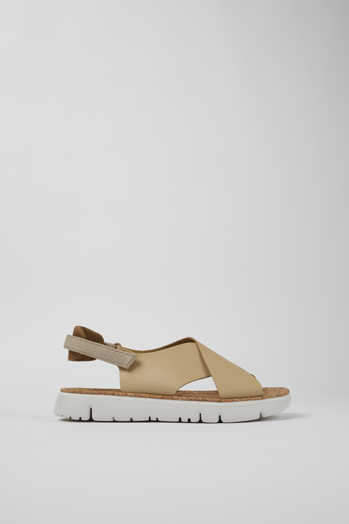Image of Side view of Oruga Beige Leather/Textile Sandal for Women
