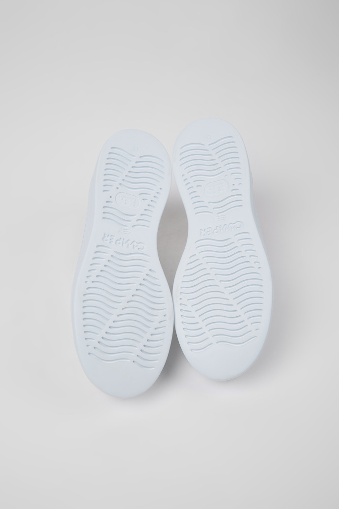 The soles of Runner Up White Sneakers for Women