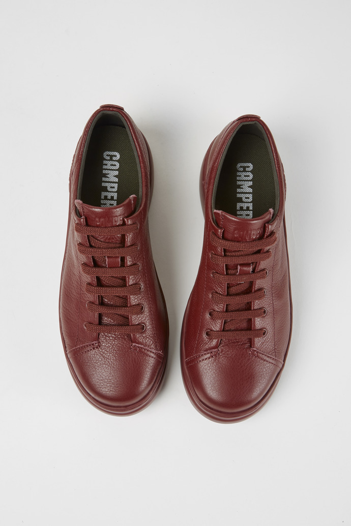 Overhead view of Runner Up Burgundy leather sneakers