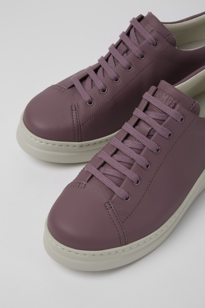Close-up view of Runner Up Purple leather sneakers
