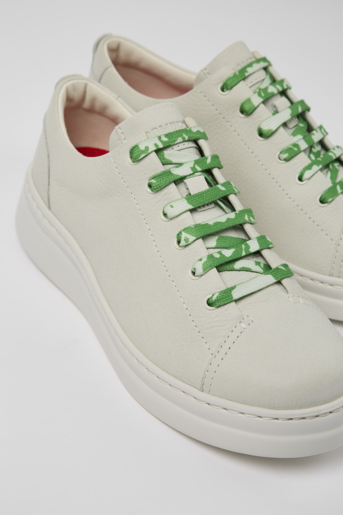 Close-up view of Runner Up White Leather Sneaker for Women