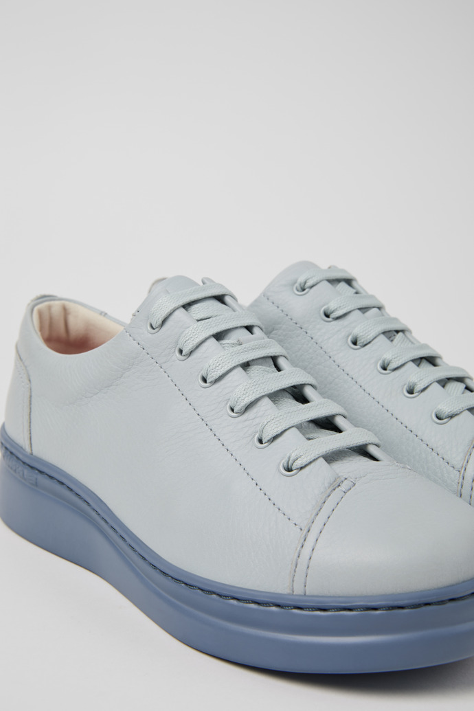 Close-up view of Runner Up Gray Leather Sneaker for Women