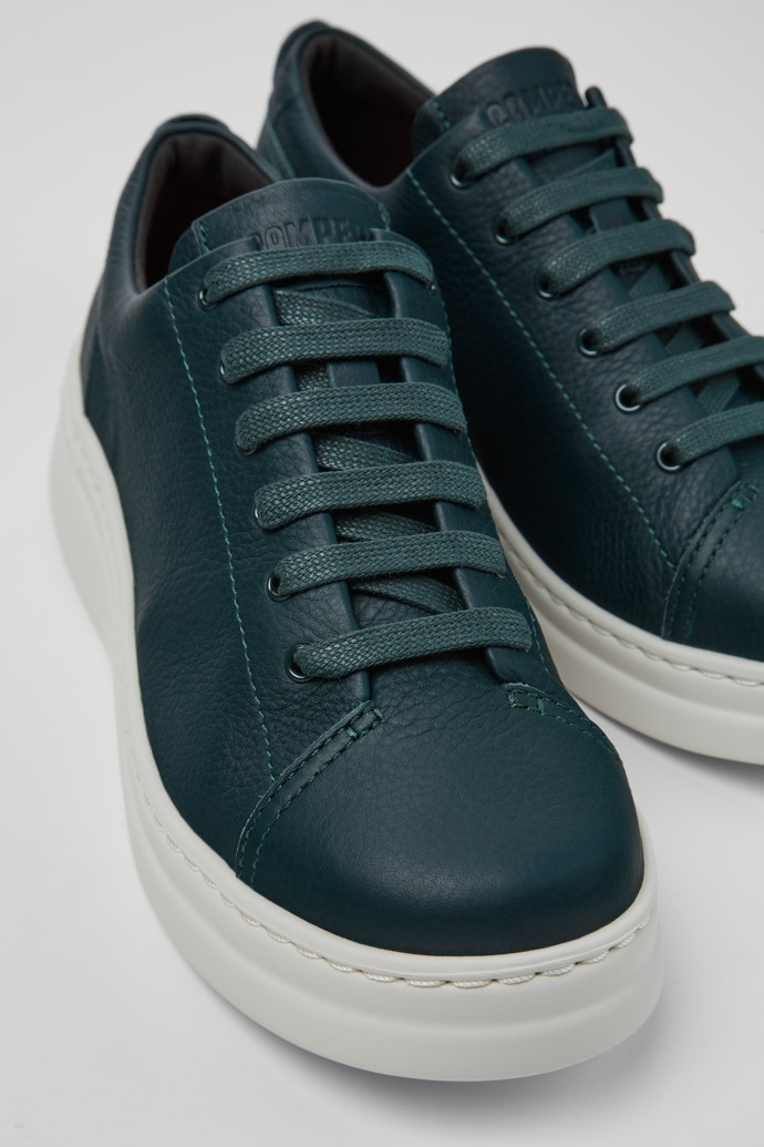 Close-up view of Runner Up Green Leather Sneaker for Women