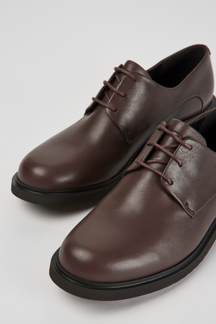 Close-up view of Neuman Brown leather lace-up shoes