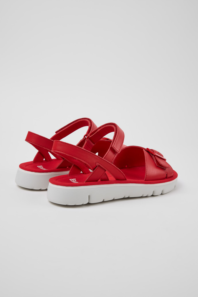 Oruga Sandalias de piel rojas para mujer.