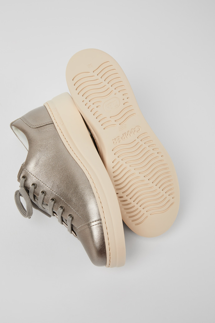 The soles of Runner Up Metallic beige metallic sneaker for women