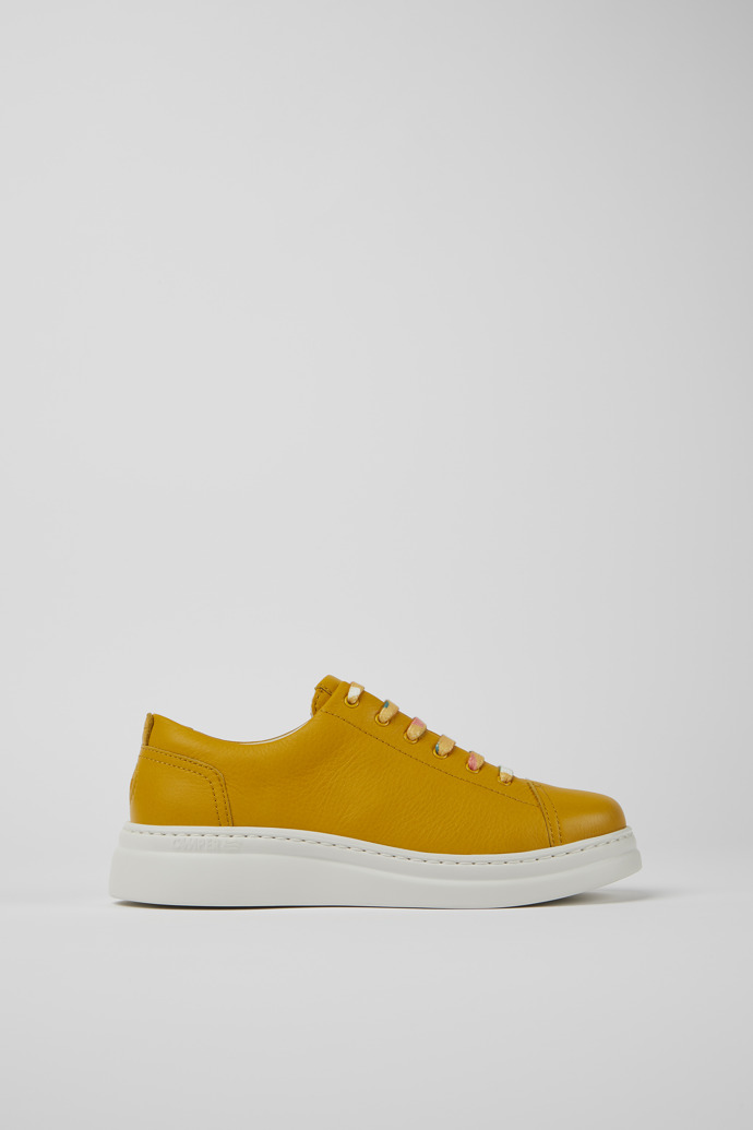 Side view of Runner Up Yellow leather sneakers for women