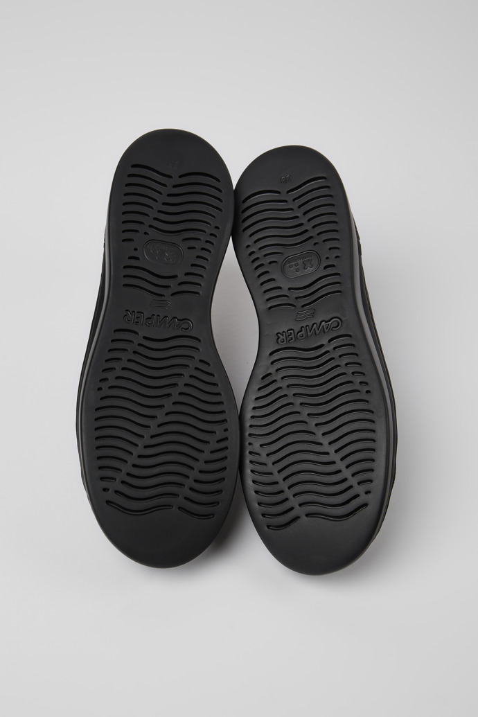 The soles of Runner Up Gray nubuck sneakers for women
