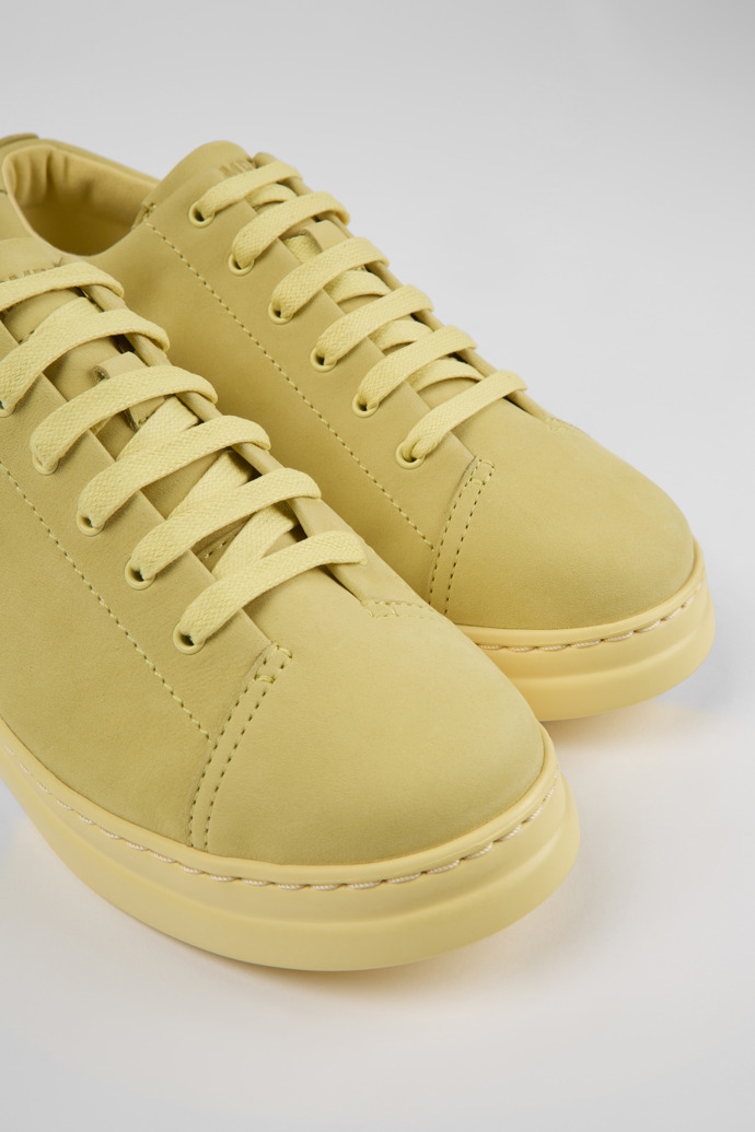 Close-up view of Runner Up Yellow nubuck sneakers for women