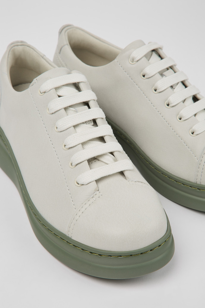 Close-up view of Runner Up White non-dyed leather sneakers for women
