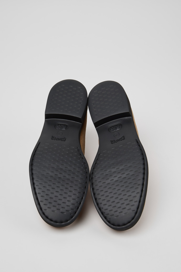 The soles of Iman Brown Suede Leather Shoes for Women.