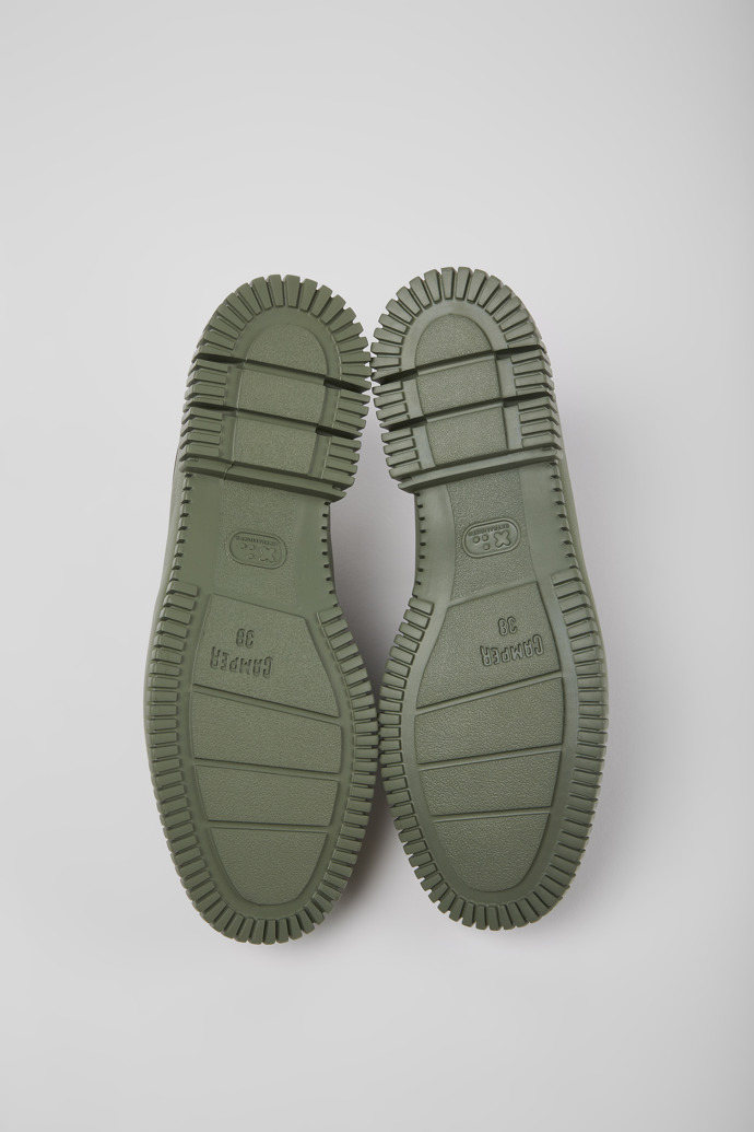 The soles of Pix Green shoes for women