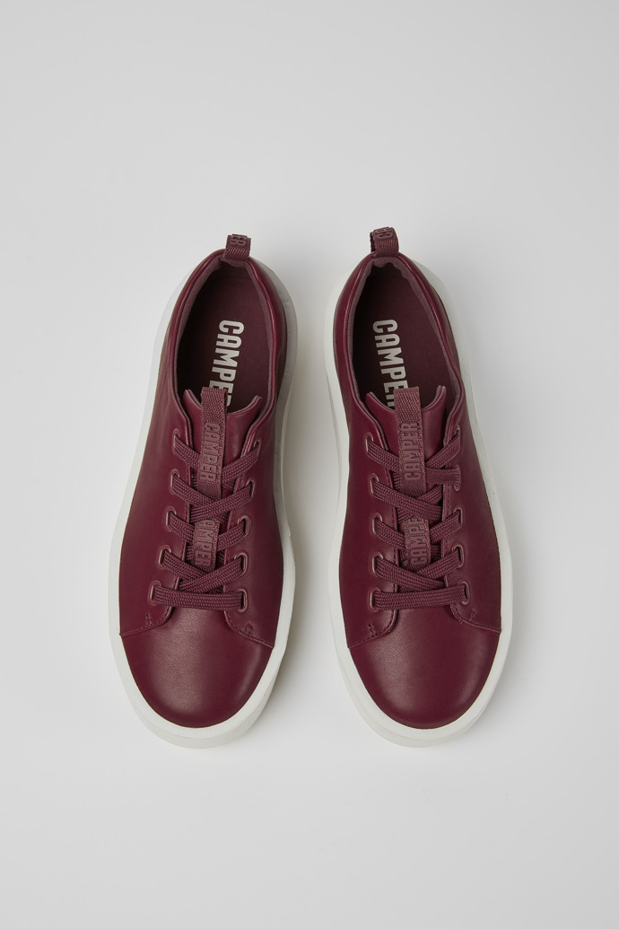 Overhead view of Courb Burgundy leather sneakers for women