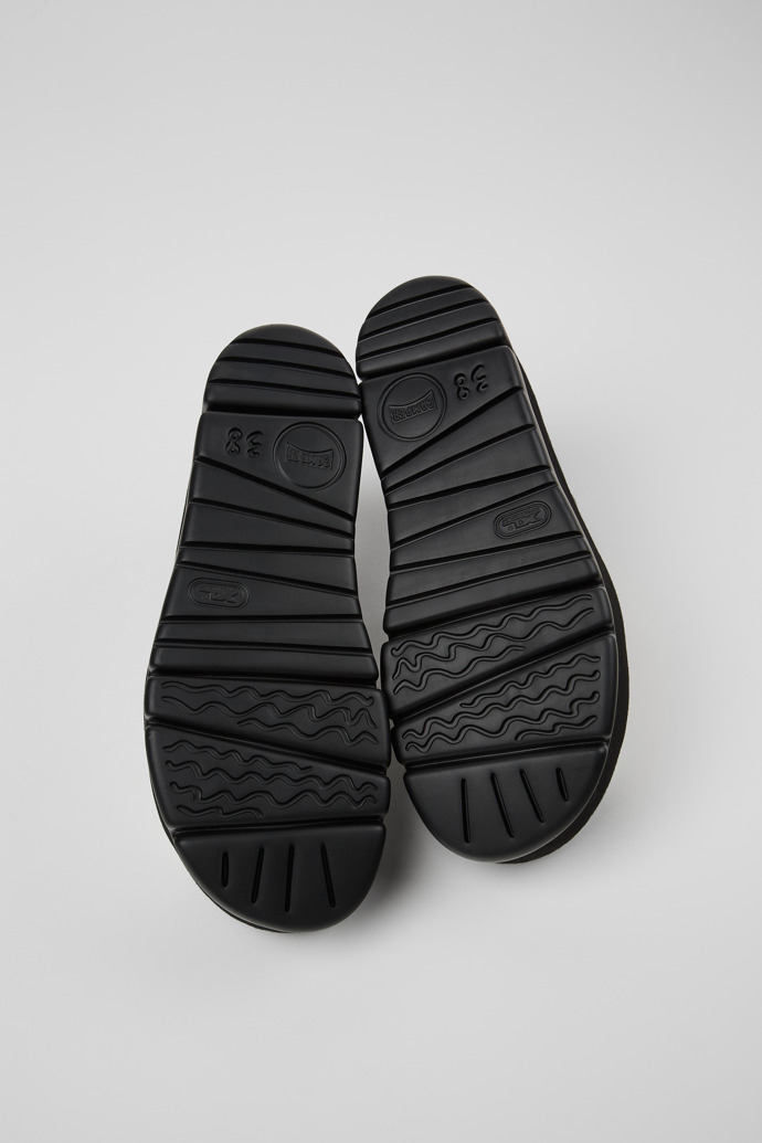 The soles of Oruga Up White Sandal for Women