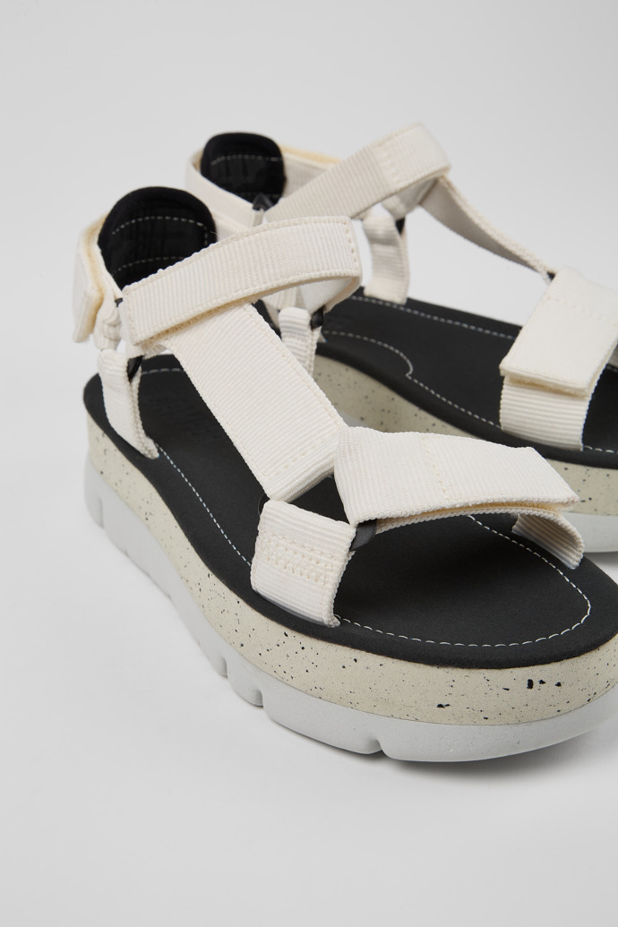 Close-up view of Oruga Up White sandal for women