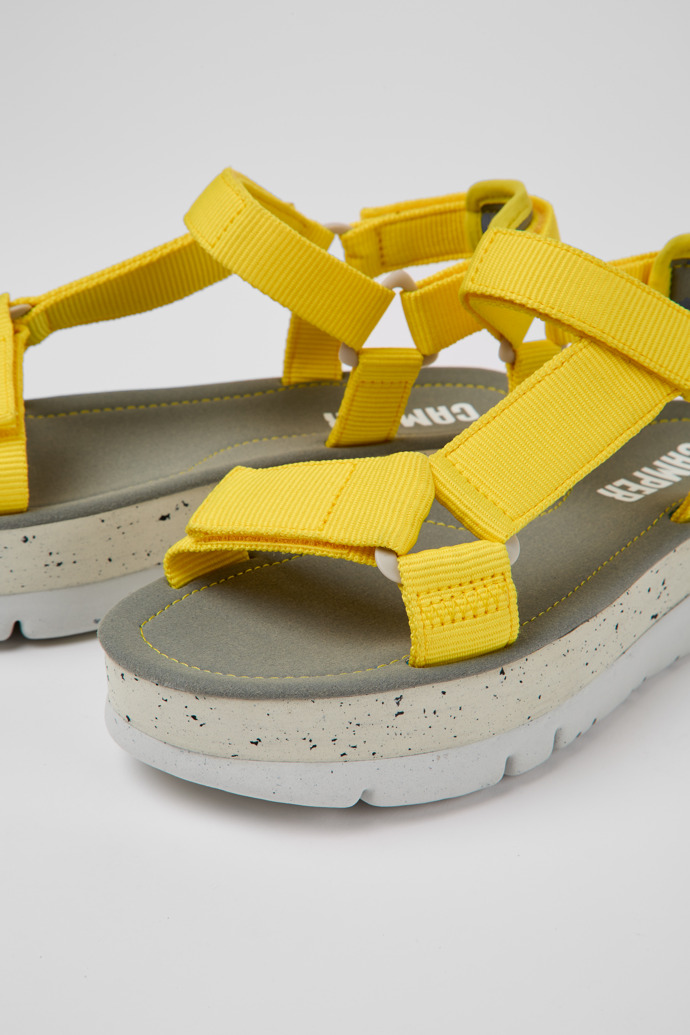 Close-up view of Oruga Up Yellow recycled PET sandals for women