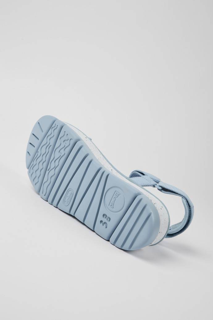 The soles of Oruga Up Blue textile sandals for women