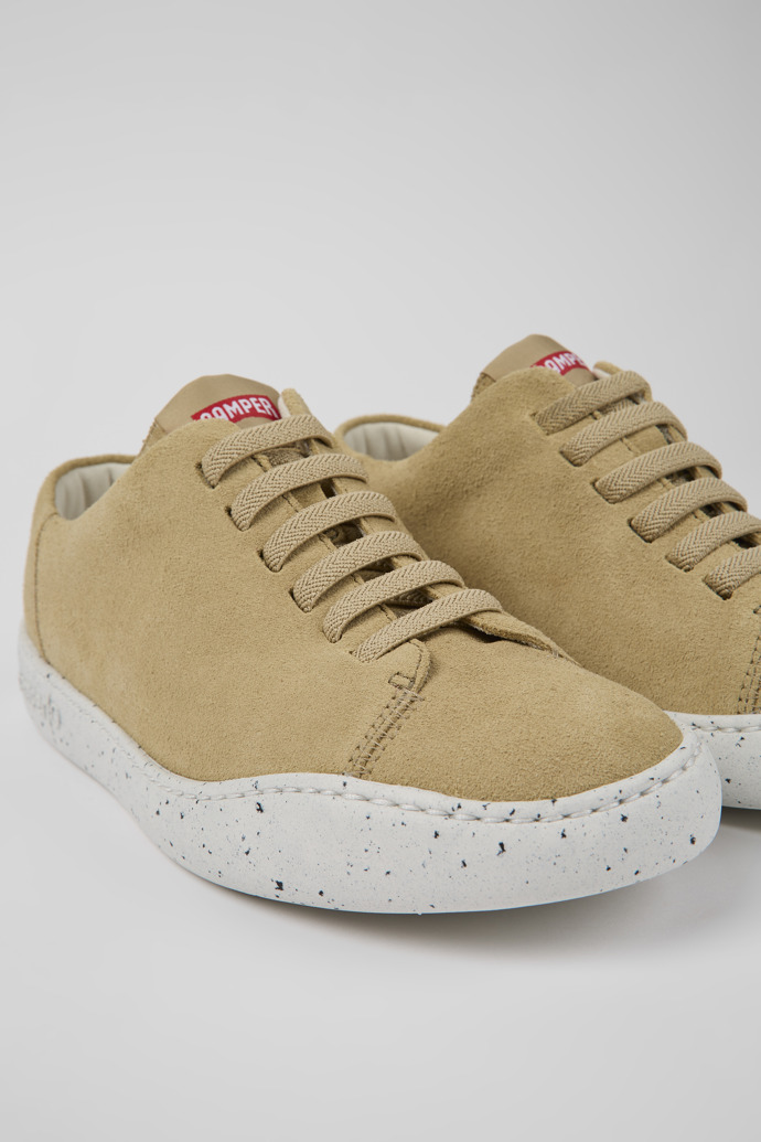 Close-up view of Peu Touring Beige nubuck sneakers for women