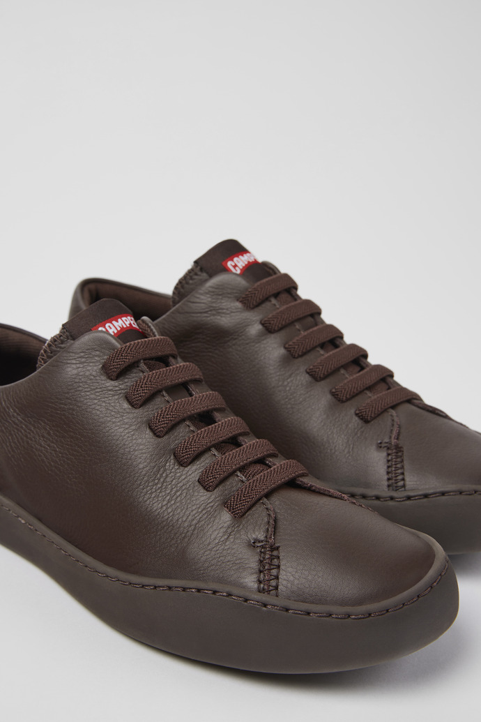 Close-up view of Peu Touring Burgundy leather sneakers for women