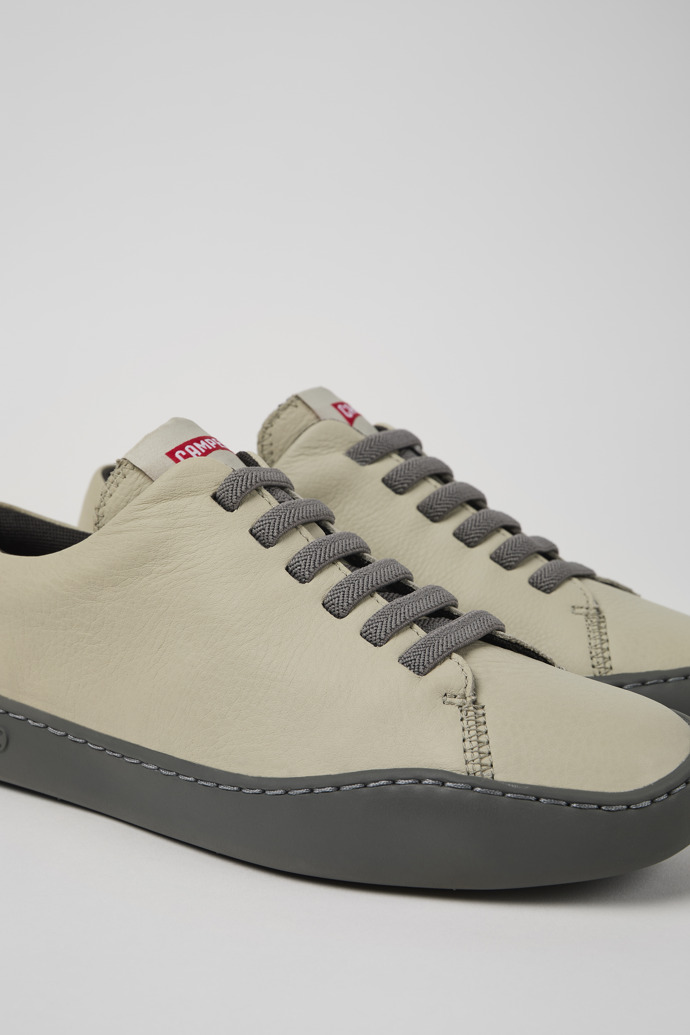 Close-up view of Peu Touring Gray leather sneakers for women