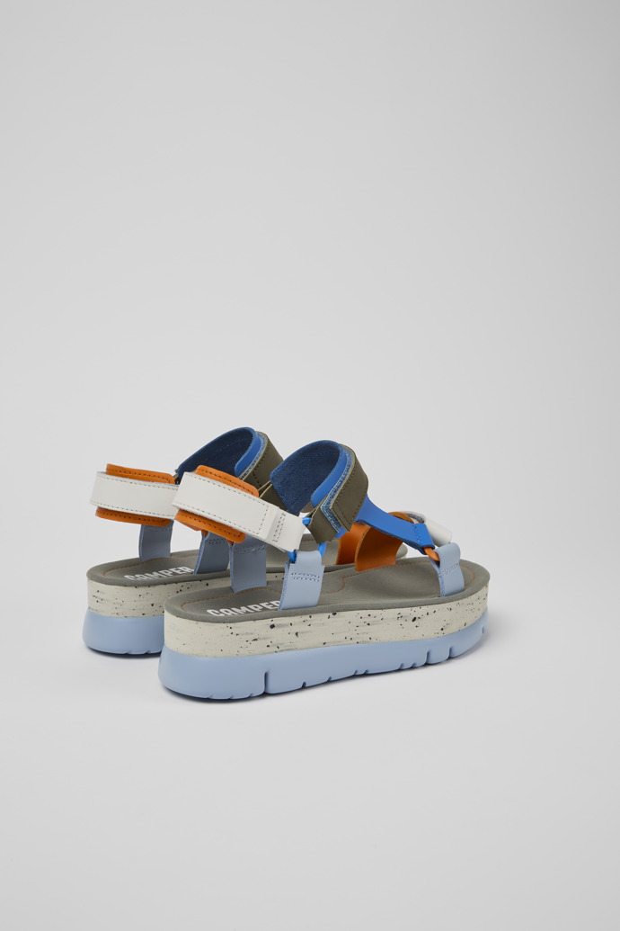 Back view of Oruga Up Blue, orange, and white leather sandals for women