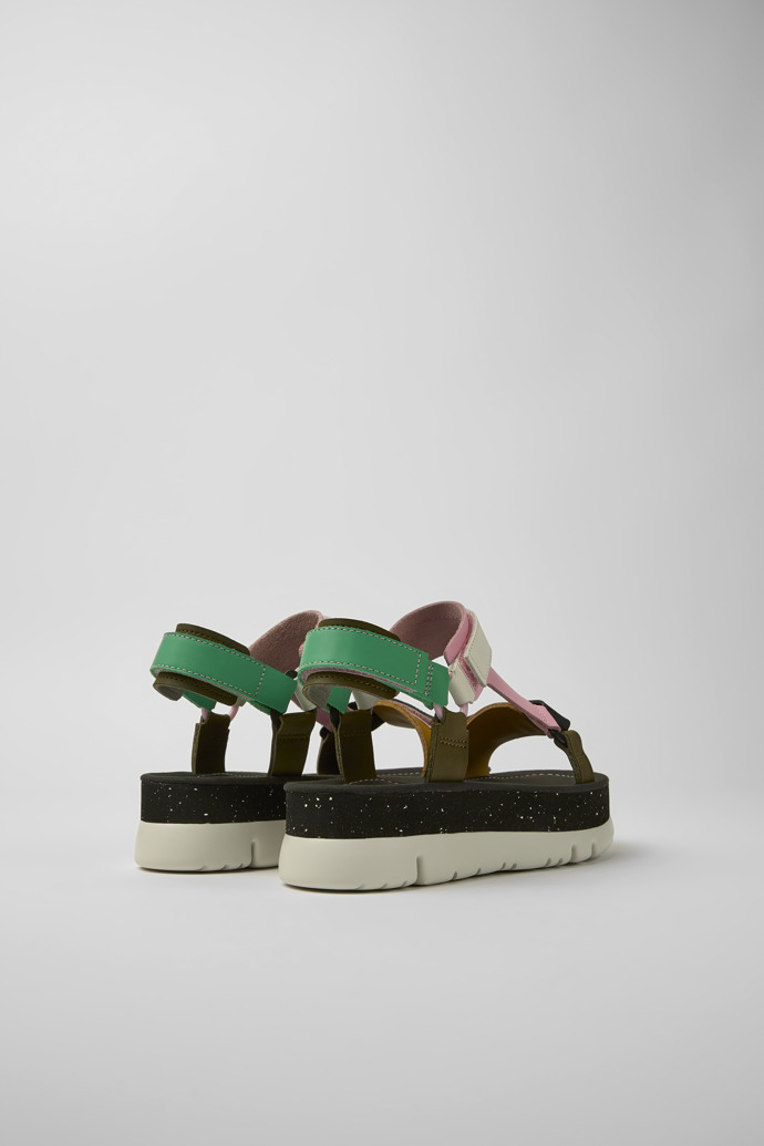 Back view of Oruga Up Green, pink, and white leather sandals for women