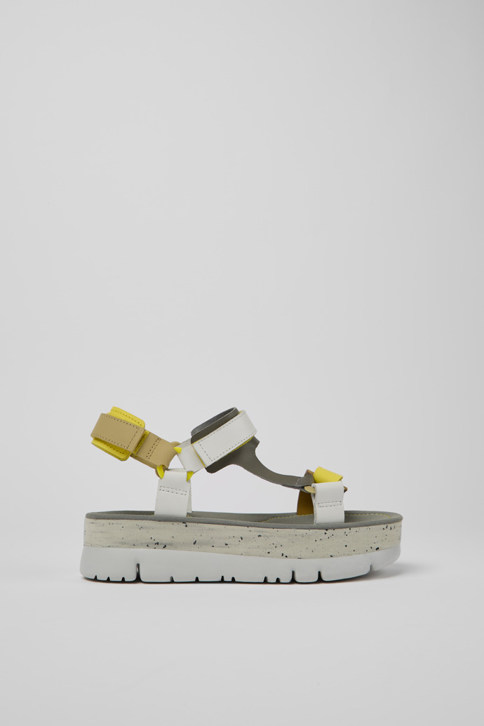 Image of Side view of Oruga Up White, grey, and yellow leather sandals for women