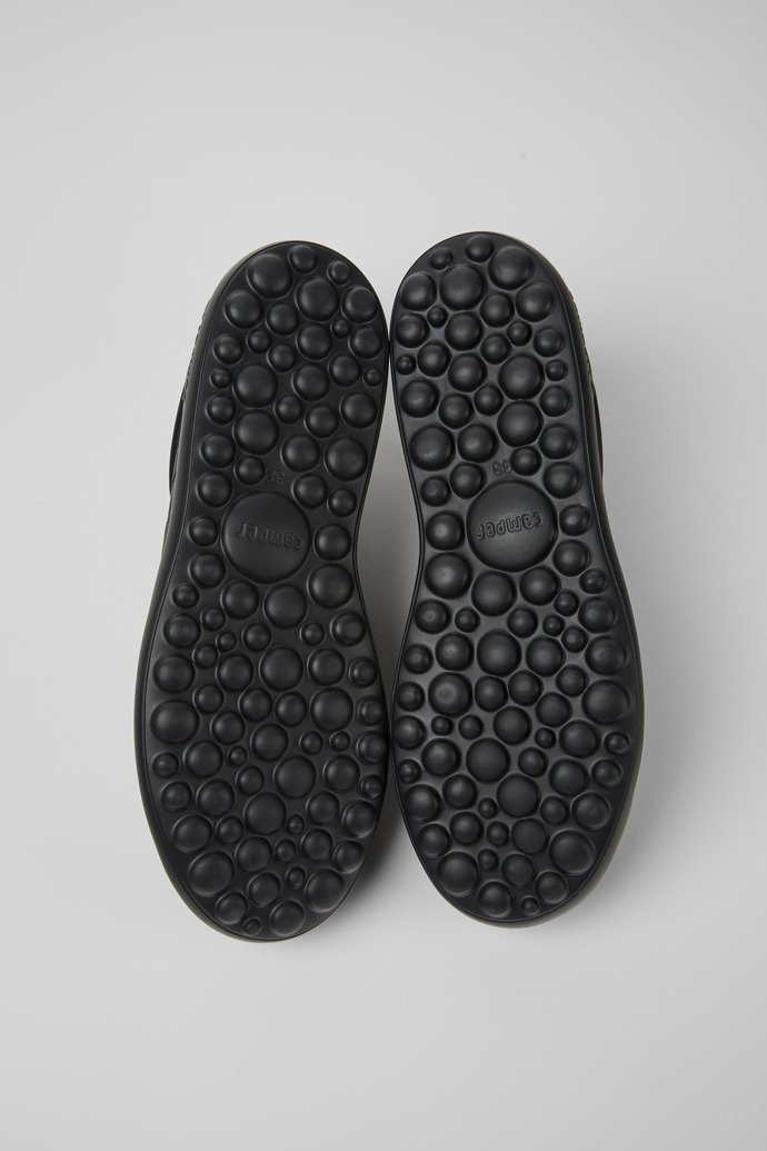 The soles of Pelotas XLite Black Leather and Textile Sneakers for Women