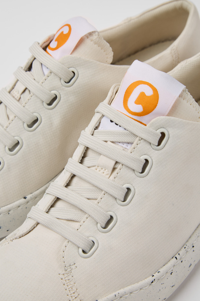 Close-up view of Peu Touring White recycled PET women's sneakers